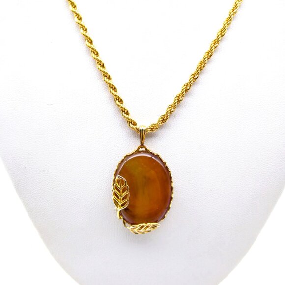 Vintage Necklace with Oval Orange Glass Cabochon Pendant and Leaf Accents on a G - Picture 1 of 5